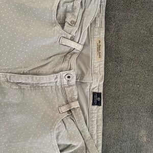 AG grey and white polka dots on them